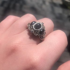 Beautiful Vintage metallic silver colored ring with black and silver gem details